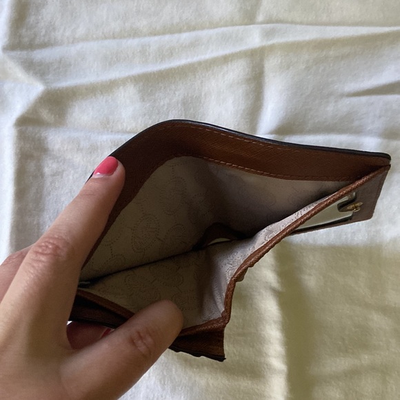 Small Michael Kors wallet with card holders in great shape lightly used. - Picture 3 of 3